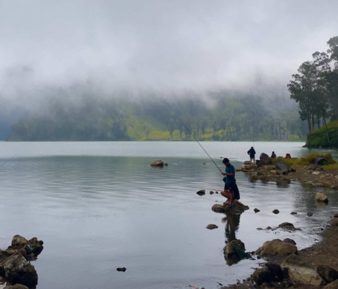 Fishing in the mist at Segara Anak crater lake
